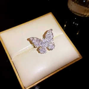 Full diamond butterfly ring with cubic zirconia on a luxury display box