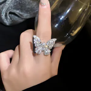 Detailed close-up of a sparkling silver-toned butterfly ring featuring marquise zircon stones