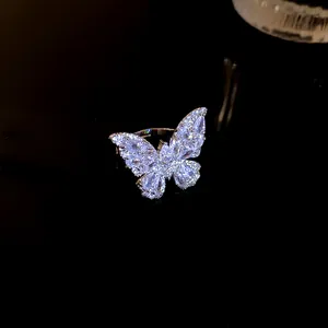 Detailed macro view of a sparkling butterfly ring set with full marquise cut cubic zirconia.
