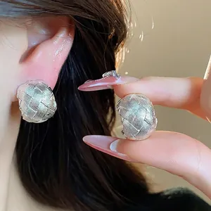 Eleganti clip per orecchie intrecciate argento, placcate oro 18 carati