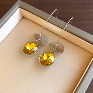 Orecchini vintage in argento con cristallo giallo sfaccettato e ciondoli geometrici