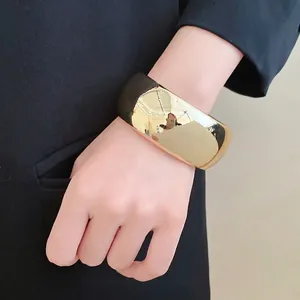 Fashionable chunky gold acrylic cuff bracelet with geometric faceted design for women