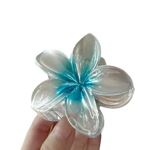 Translucent gradient plumeria flower hair claw clip in candy colors for elegant updos