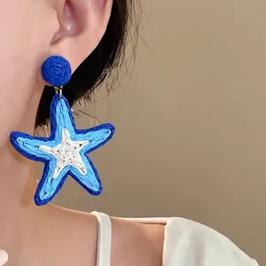 Handmade blue woven star earrings with steel needle for summer beach vacation look