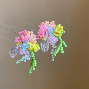 Handmade colorful dopamine style beaded flower tassel earrings with vibrant floral design