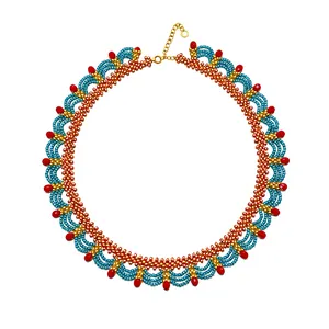 Ethnic style beaded lace necklace featuring blue and red glass beads with gold accents