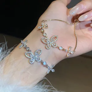 Elegant butterfly zircon bracelets in gold and silver finish, sparkling jewelry detail