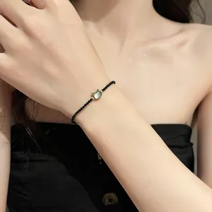 Elegant black crystal bead bracelet featuring a minimalist cat head charm for daily wear