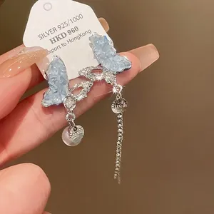 Elegant crystal and pearl butterfly tassel earrings with silver needle for women