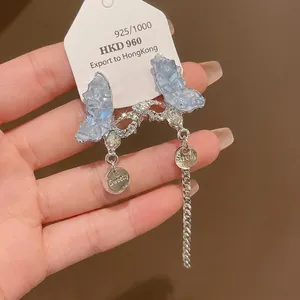Elegant blue crystal butterfly tassel earrings with silver rhinestones and pearls