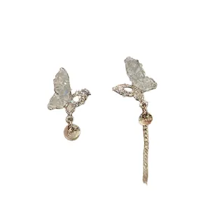 Elegant asymmetric butterfly tassel earrings with sparkling crystals and silver needle for women