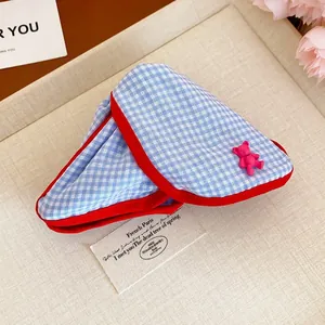Blue checkered fabric triangle hair clip with red trim and pink bear decoration
