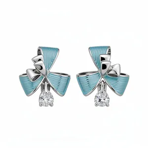 Orecchini a clip con fiocco in smalto azzurro e zircone a goccia, placcati oro 18k