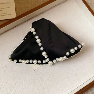 Elegant black fabric triangular hair claw clip with pearl embellishments