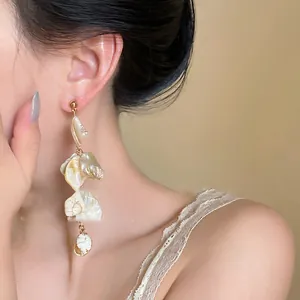 Long irregular shell drop earrings with mother-of-pearl luster for summer beach vacation