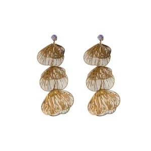 Exaggerated gold tiered flower tassel drop earrings with sparkling stud rhinestones