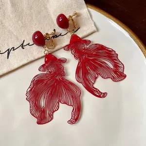 Elegant red goldfish hollow clip-on earrings in New Chinese style design