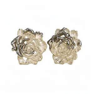 Elegant silver-toned resin rose flower stud earrings featuring a detailed textured petal design