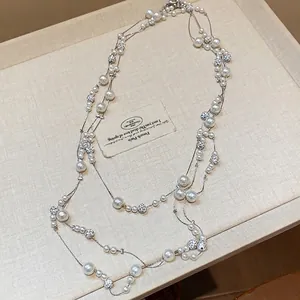 Elegante collana a strati stile francese con perle e cristalli per maglioni da donna