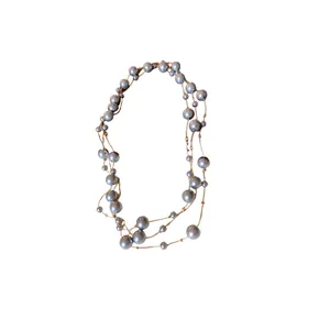 French style minimalist long necklace with multi-size grey faux pearls on gold cord.