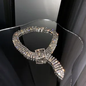 Elegant sparkly full rhinestone belt buckle choker necklace displayed on a reflective surface