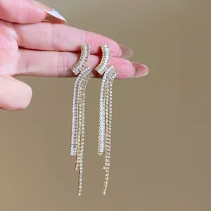 Elegant zircon geometric tassel earrings with brilliant shimmering silver needle detail