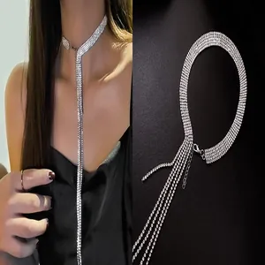 Elegant sparkling multi-row rhinestone choker with long tassel drop, shown worn and laid flat.