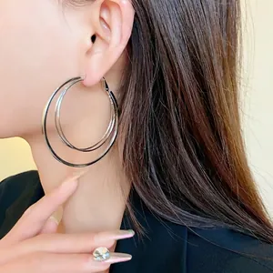 Stylish multi-layer silver hoop earrings for women with an exaggerated fashion design