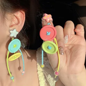 Colorful dopamine-style button and star tassel earrings with long cords and beads