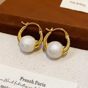 Elegant 18k gold plated pearl hoop earrings in French vintage style for women.