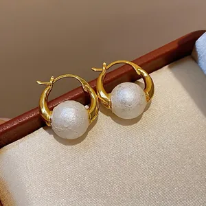 Vintage 18k gold plated hoop earrings featuring textured white pearls in a gift box