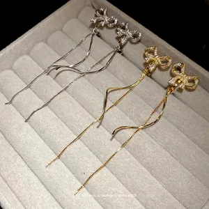 Elegante 18k vergoldete Zirkon-Schleifen-Ohrclips mit Quasten für Ohren ohne Löcher