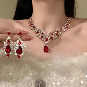 Detailed view of luxury vintage red zircon teardrop necklace and earrings set for women