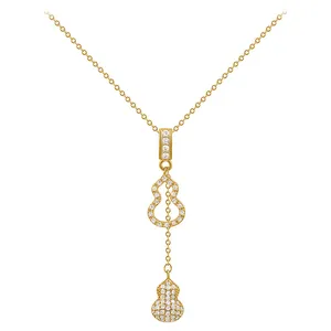 Collier élégant plaqué or avec pendentif double gourde et pierres étincelantes
