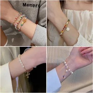 Detailed collage showing various cat's eye stone heart and pearl beaded bracelets for women