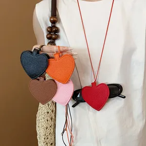 Fashionable leather heart-shaped sunglasses holder necklace in multiple vibrant colors