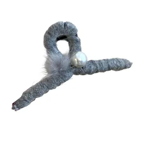 Elegant grey flocked hair claw clip featuring a white pearl and soft fur ball decoration