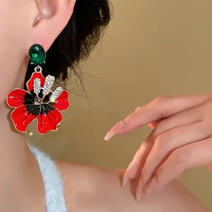 Eleganti orecchini a fiore vintage francesi con strass e cristallo verde per donna