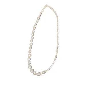 Stylish silver beaded necklace with unique asymmetrical design on white background