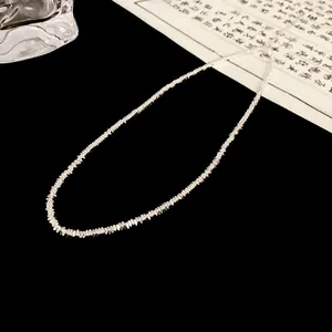 Minimalist irregular silver beaded necklace for women, stylish collarbone chain jewelry.