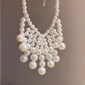 Detailed close-up view of French vintage multilayer pearl necklace showing elegant luster and design
