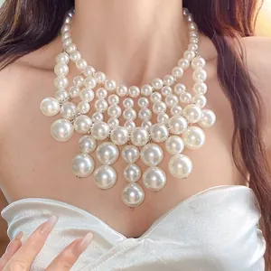 Elegant multi-layer oversized pearl bib necklace for women shown on model for party wear