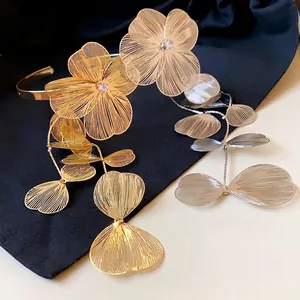 Elegant floral zircon tassel open armlet bangle with metallic wire-work petals.