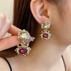 Vintage palace style earrings featuring square and oval gemstones with crystal rhinestones