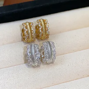 Elegant 18K gold plated zircon hollow hoop earrings with vintage court style design.