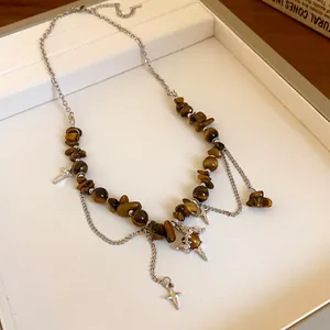 Vintage stainless steel necklace with irregular tiger eye stones and star pendants