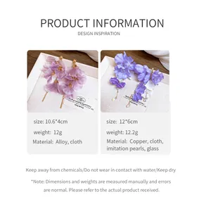 Détail de boucles d'oreilles fleurs en tulle violet avec spécifications de taille