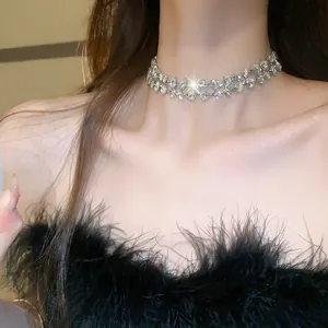 Close-up detail of a glamorous double-layer irregular oval rhinestone choker necklace