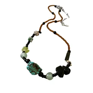 Vintage Chinese style handcrafted beaded necklace with turquoise stones and silver flower charm