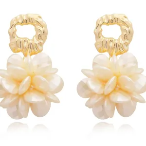 Elegant French style gold wrinkled circle earrings with cream pearlescent flower drops